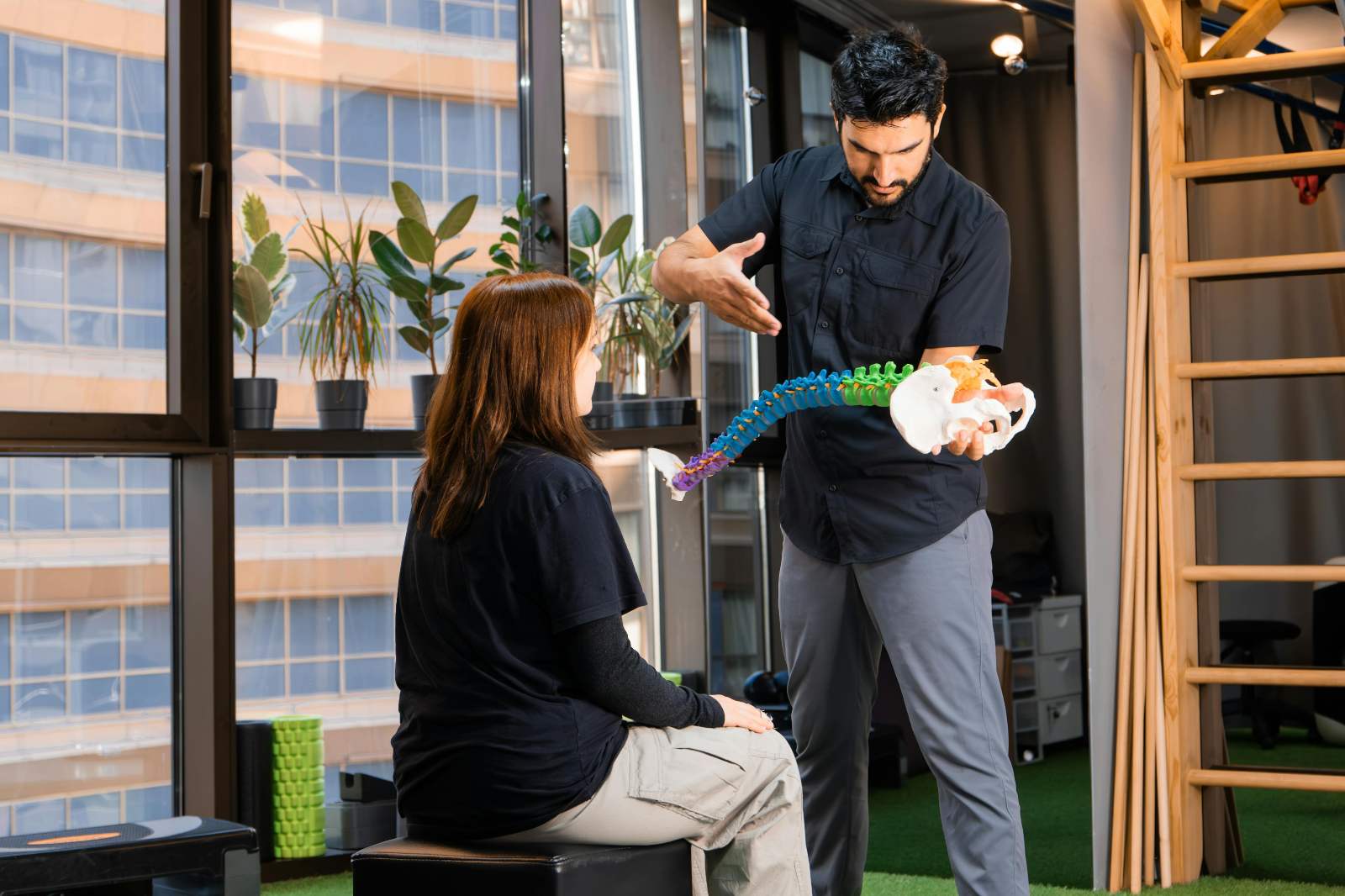 Physiotherapist assessing a patient's Achilles tendon