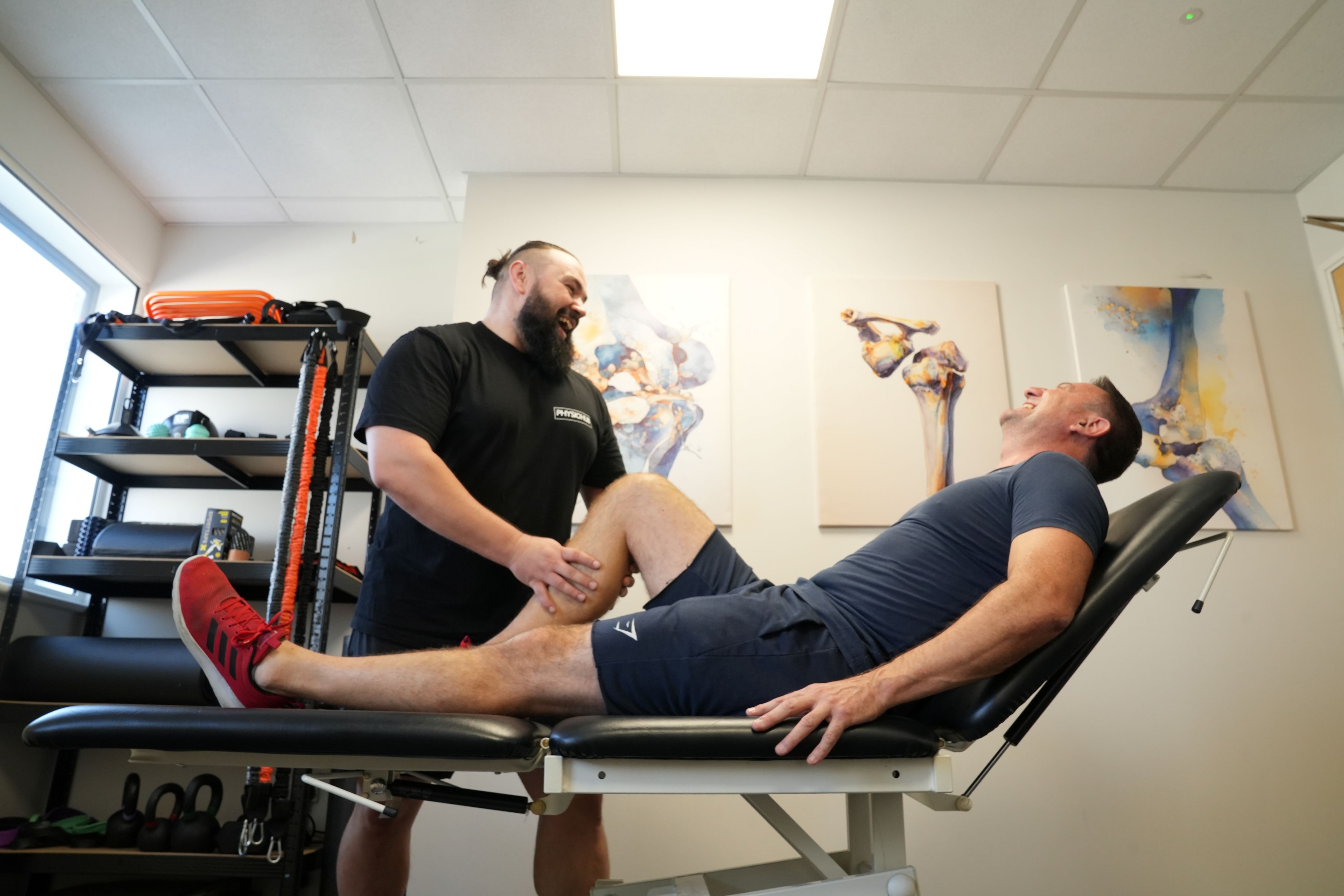 Person working through a strength test on a resistance machine in a gym